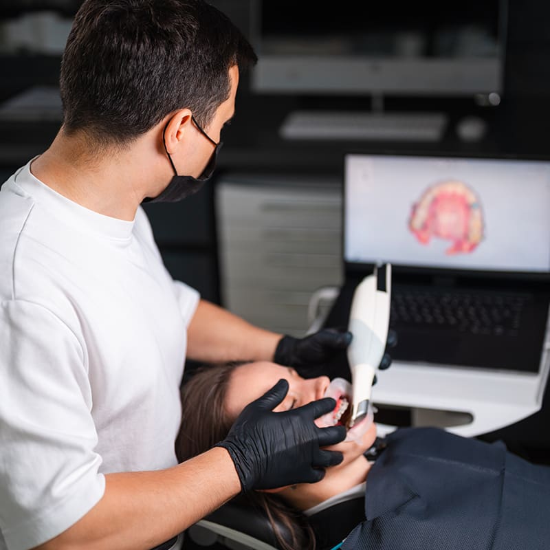 Dentist performing a 3D oral scan